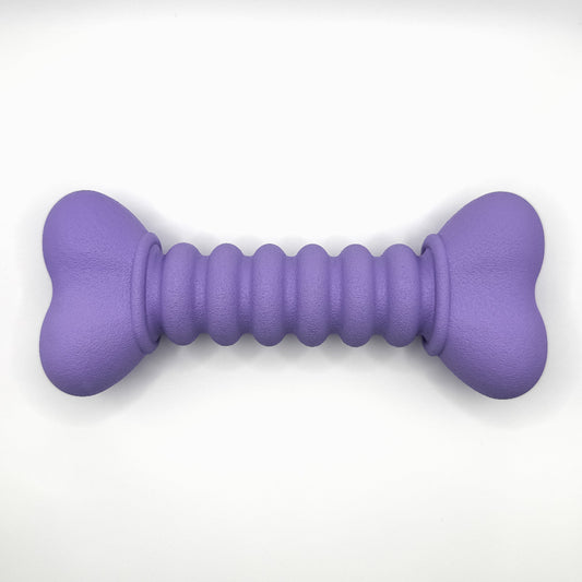 Ribbelbot_hondenspeelgoed_van_natuurlijk_rubber_paars_of_beige_ribbelstructuur_van_boven