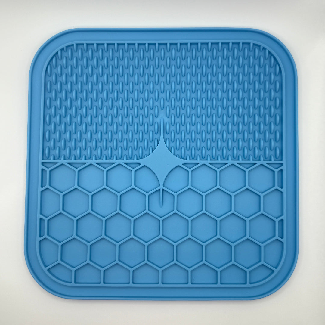 Blauwe silicone likmat voor honden en katten, voedselveilig en BPA-vrij, met zuignoppen en textuurvlakken