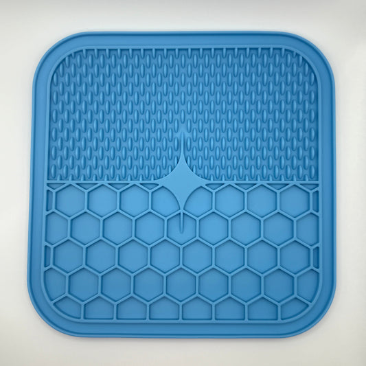 Blauwe silicone likmat voor honden en katten, voedselveilig en BPA-vrij, met zuignoppen en textuurvlakken