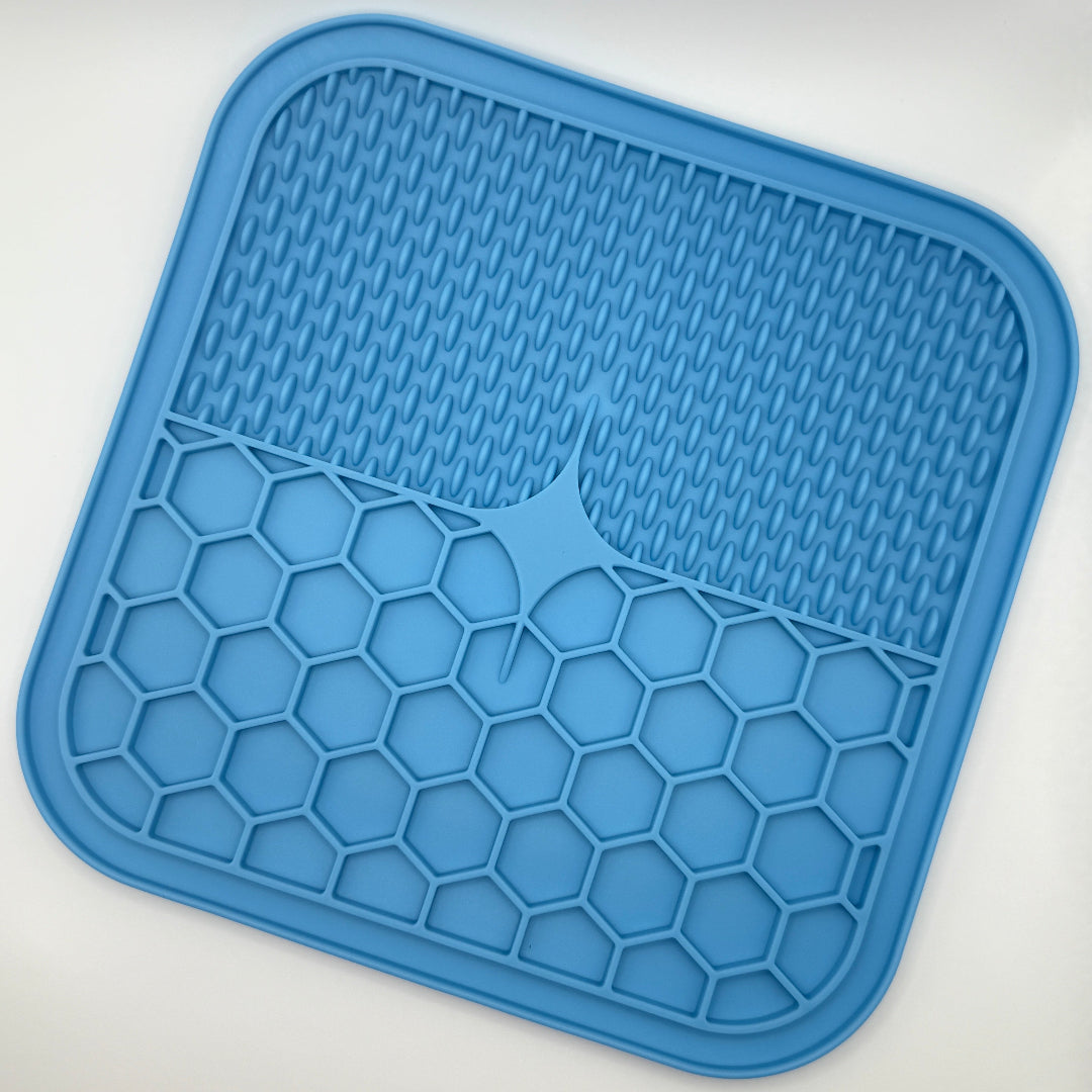 Blauwe silicone likmat voor honden en katten, voedselveilig en BPA-vrij, met zuignoppen en textuurvlakken