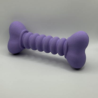 Ribbelbot hondenspeelgoed van natuurlijk rubber – paars of beige, ribbelstructuur schuin voorkant