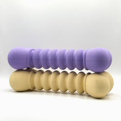 Ribbelbot_hondenspeelgoed_van_natuurlijk_rubber_paars_of_beige_ribbelstructuur_paars_op_beige