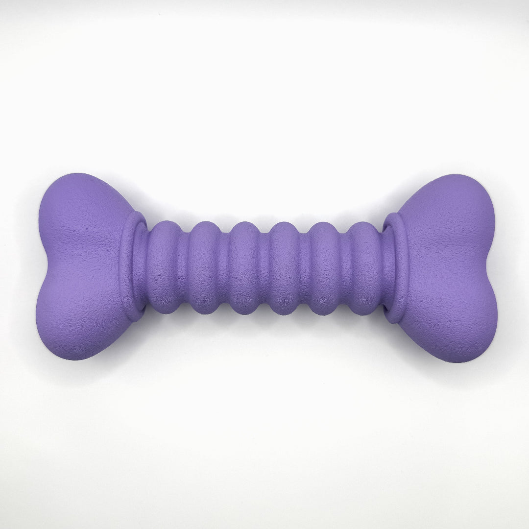 Ribbelbot_hondenspeelgoed_van_natuurlijk_rubber_paars_of_beige_ribbelstructuur_van_boven